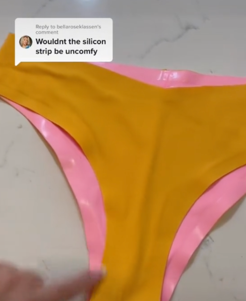 Yellow bikini bottom, pink edge; overlay text Reply to bellaroesklassen's comment — Wouldnt the silicon strip be uncomfy