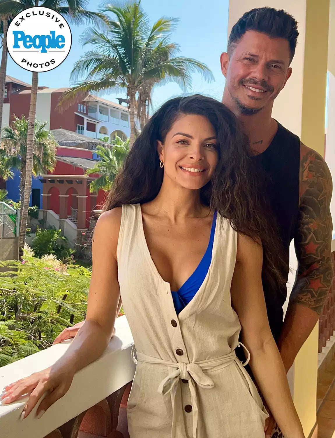 Mari Pepin and husband on a resort balcony during their honeymoon, palm trees behind them — EXCLUSIVE PHOTOS People