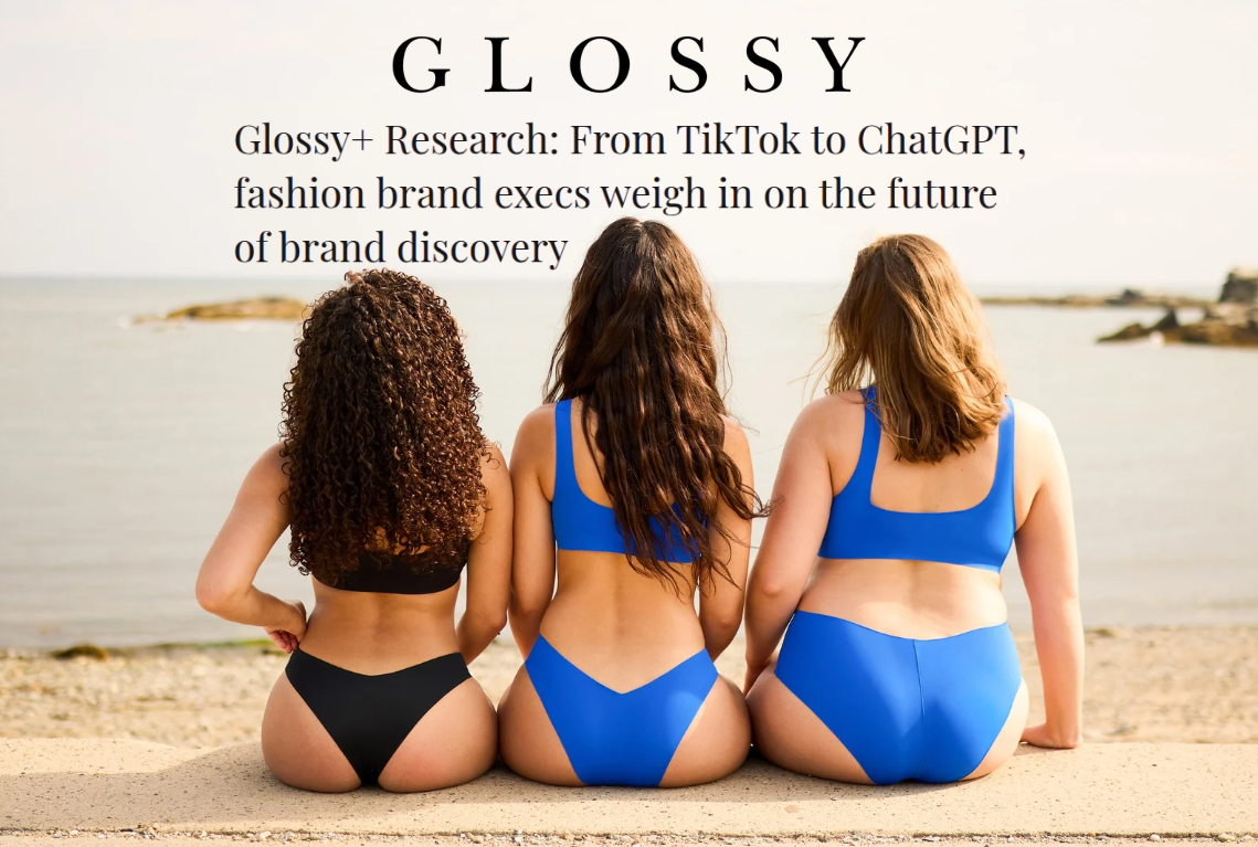 Back view of three models in onewith swimwear showing cheeky to full coverage bottoms in blue and black at a beach