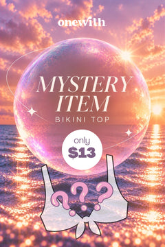 Illustrated mystery bikini top with question marks against a sparkling sunset beach background