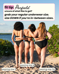 Three women in swimsuits standing on a beach with text about size guidance.