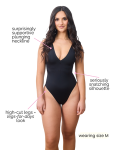 Woman wearing a black swimsuit with text highlighting features on a white background