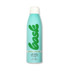 Bask mineral sunscreen aerosol can, turquoise bottle with green 'bask' logo and 'MINERAL SUNSCREEN' text.