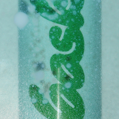 Bask mineral sunscreen aerosol can with condensation and cursive lettering