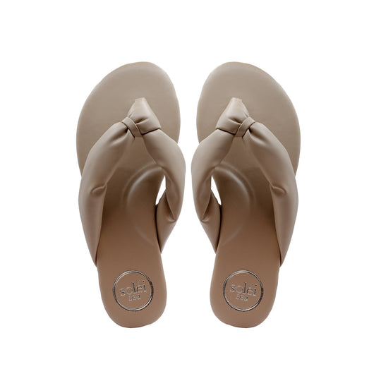Beige thong flip-flop sandals, top view, pair with textured footbeds