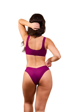 Woman wearing a purple bikini